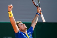 Wawrinka wins first match back after knee surgery