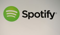 Spotify agrees to fund to settle copyright suits