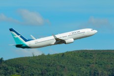 Singapore Airlines teams up with Grab to offer seamless travel experience