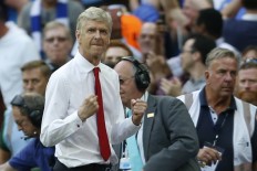 Wenger signs new two-year Arsenal contract