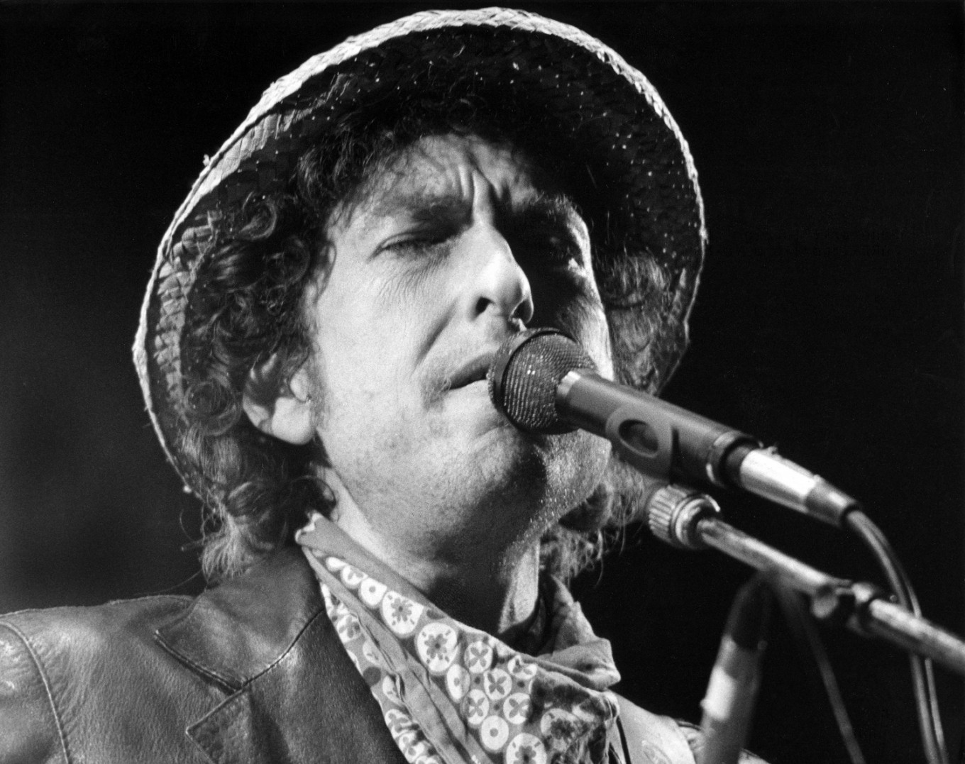This file photo taken on June 03, 1984 shows US singer Bob Dylan performing during a concert at the Olympic stadium in Munich, southern Germany.