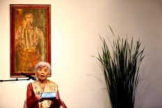 Rosalina Poppeck or known as Rose Pandanwangi, the wife of the Indonesia legend painter, Sudjojono, sings Mawar di malam hari in the opening of a sketch painting exhibition of Sudjojono titled Hidup Mengalun Dendang at Bentara Budaya, Jakarta on Tuesday, June 6. 2017. 