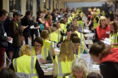 British PM poised to win vote but lose majority as Brexit looms