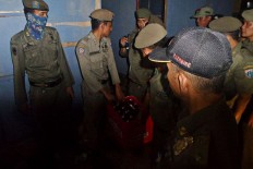 Condoms, liquor and crystal meth pipes found during raid in Kalijodo 