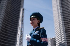 Driven to distraction: Pyongyang's 'traffic ladies'