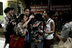 Police arrest two more men in connection with deadly shooting in West Jakarta