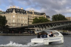 Noiseless river 'bubble' taxi sails through Paris test