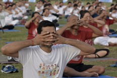 WHO calls for better health through yoga