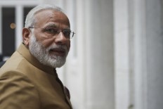 India's Modi heads to Washington for 'no frills' Trump meet