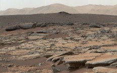 This file handout picture released by the NASA on December 9, 2013 and taken from the Mast Camera (Mastcam) instrument on NASA's Curiosity Mars rover shows a series of sedimentary deposits in the Glenelg area of Gale Crater. A team of the School of Physics and Astronomy at the University of Edinburgh discovered that the red planet would be 