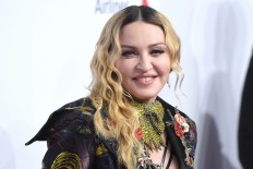 Madonna asks court to block love letter auction