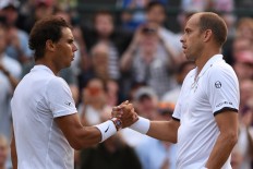 Nadal stunned by Muller in Wimbledon epic