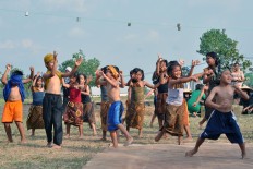 Children perform a Tandur dance during the cultural festival. JP/Magnus Hendratmo