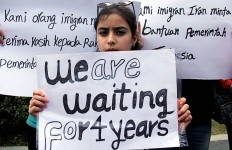 Hundreds of asylum seekers demand justice, humane treatment