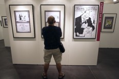 Charlie Hebdo publishes provocative Islam cartoon