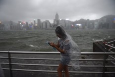 Four dead as typhoon smashes into Macau and Hong Kong