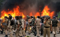 Clashes kill 32 in India as court convicts guru of rape