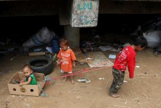 Poverty rate falls but disparity remains high