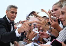 Clooney puts poison in Anywhere USA's peanut butter