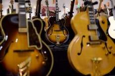 Eric Clapton, certified guitar god, says guitar-based music may be over 