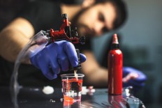 Tattoo ink can seep deep into the body: Study