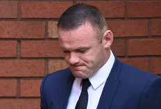 Everton's English striker Wayne Rooney arrives at Stockport Magsitrates court in Stockport, north-west England on Sept. 18, 2017. Rooney, England's all-time record goalscorer and former captain, appeared at court after being arrested by on Sept. 1, and consequently charged with driving whilst over the prescribed limit.