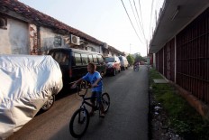 No garage, no problem: City mulls over review of carport regulation