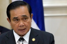 As elections loom, Thai leader gets cosy with old political clans