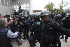 At least 91 injured in Catalonia referendum clashes