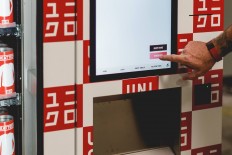 Uniqlo places clothing vending machines in U.S. airports, malls