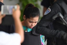  Kim Jong-Nam murder trial visits lab to view tainted clothes 