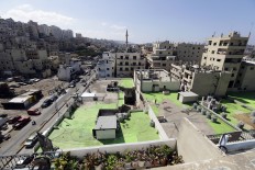 Art brings 'peace' to battle-scarred Lebanon districts