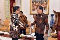 Jokowi wants Anies to prioritize development of slum areas
