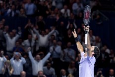 Federer wins Australian Open for 20th Slam title
