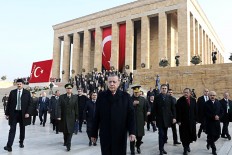 Turkey's President Recep Tayyip Erdogan (center) arrives to attend a ceremony marking the 79th anniversary of the death of Mustafa Kemal Ataturk, the founder of modern Turkey, at the deceased leader’s mausoleum in Ankara on Nov. 10, 2017.


