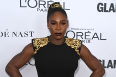 Topless, singing Serena sparks internet breast cancer stir