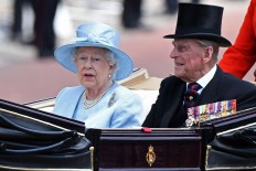 UK's Charles says Prince Philip, 98, is 'all right' in hospital