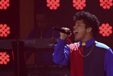 Indonesian Broadcasting Commission bans 42 songs from being played before 10 p.m.