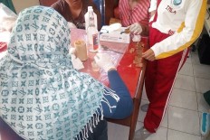 Exhibition highlights art by Bali prison inmates