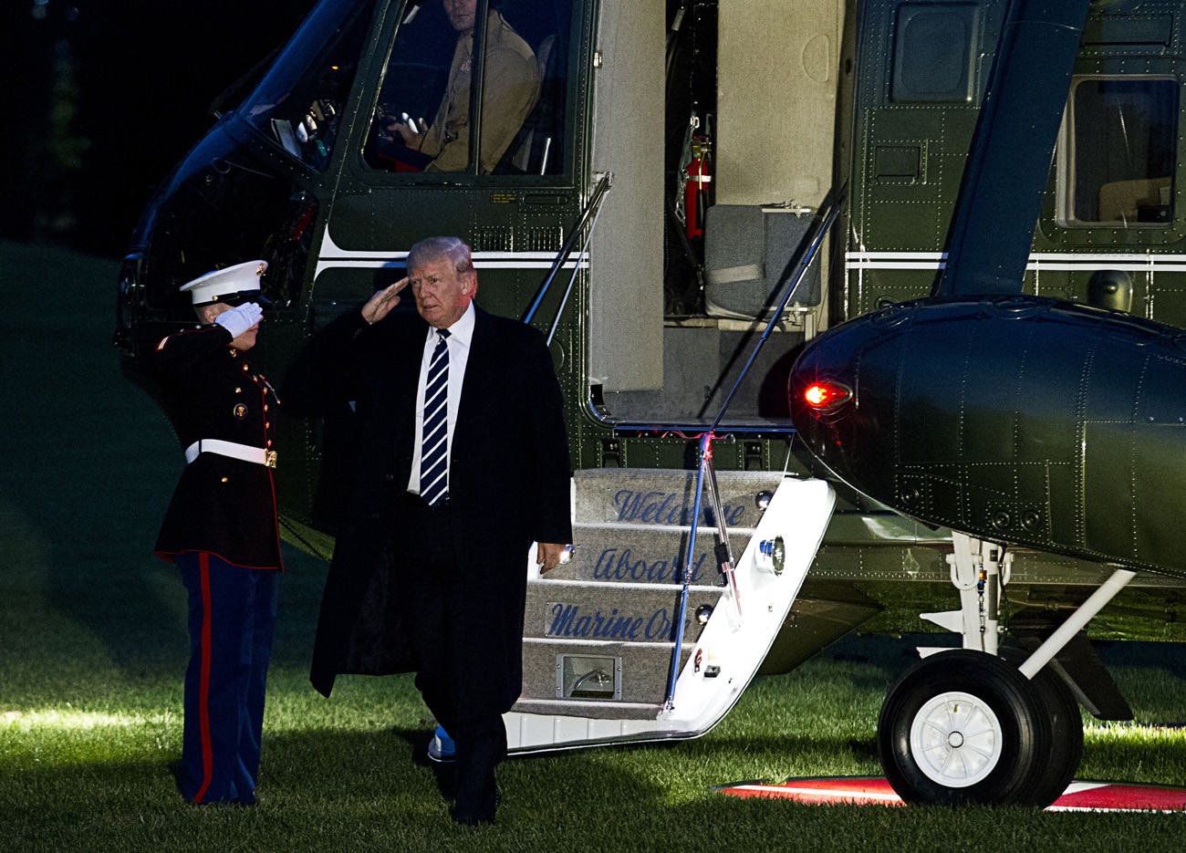 Trump shrugs off Flynn guilty plea
