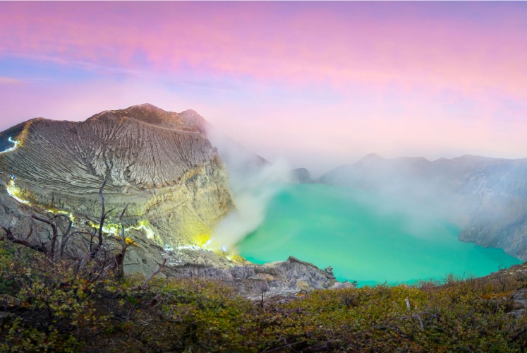 Ijen Crater on Banyuwangi under pink sunrise.