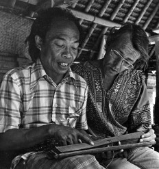 Learning: Ketut Liyer (left) explains to David Stuart-Fox a passage from a lontar (palm leaf) book in this 1977 photo, as seen inside the book Pray, Magic, Heal.