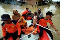 Two children die as floods strike Medan