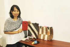 Healing through handicrafts: Sri Ratna Mbaresi showcases handicrafts made by women from Poso who survived violent sectarian clashes. The handicrafts provide an opportunity to earn income and also to ease their trauma.