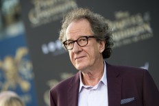 Geoffrey Rush sues paper in Australia for 'inappropriate behaviour' claim