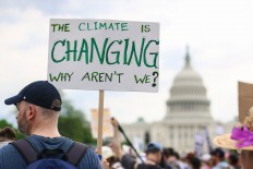 Thousands of people attend the People's Climate March to stand up against climate change. 