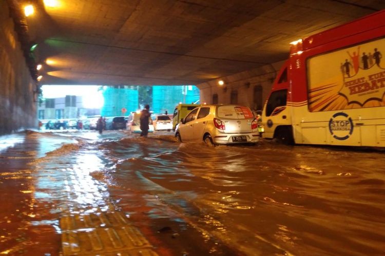 Flood waters seen at Cawang underpass in East Jakarta on Dec. 12.