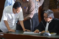 Police complete dossier of former journalist who allegedly crashed car carrying Setya