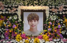 K-pop stars withdraw from activities after death of Jonghyun