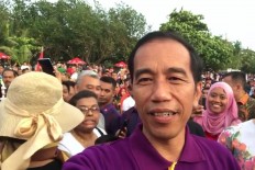 Jokowi declines to comment on his minister's leaked conversation 